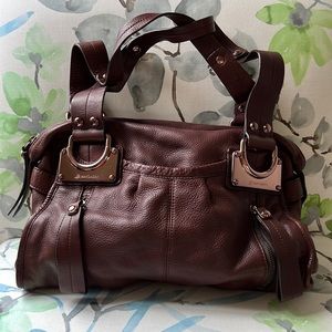 B. Makowsky genuine leather handbag.